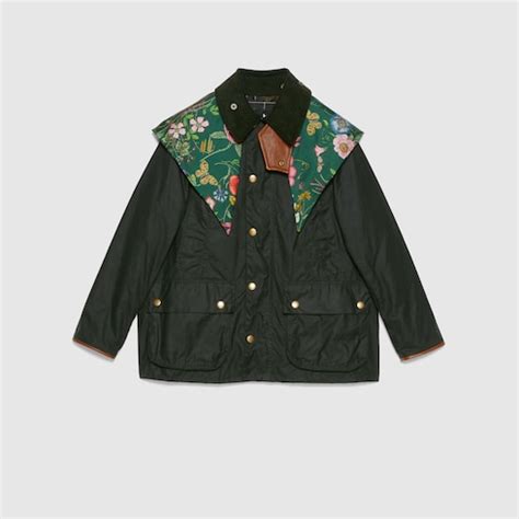 Barbour wax cotton jacket with Gucci Flora silk hood